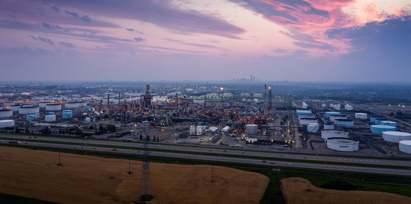 An aerial view of the Edmonton Refinery. The Edmonton skyline is in the background.