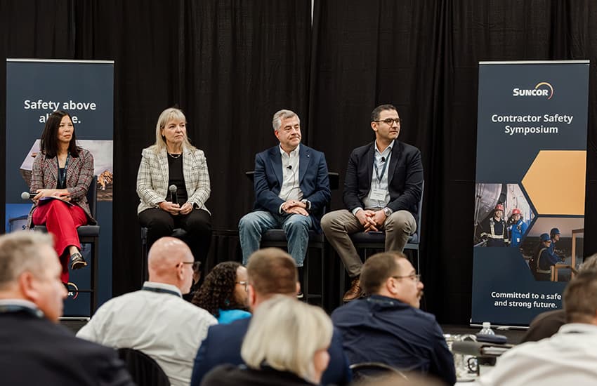 Four members of Suncor’s leadership team sit on stage during a panel discussion at the September 2026 Contractor Safety Symposium in Fort McMurray, Alberta.