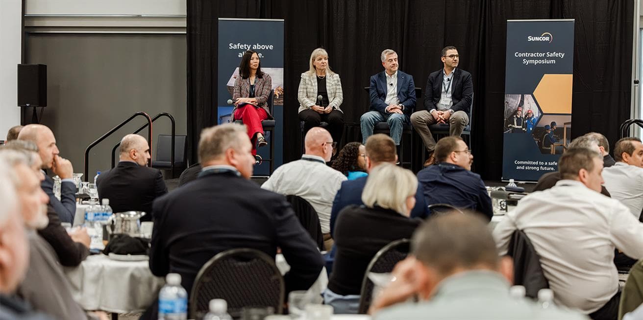 Four members of Suncor’s leadership team sit on stage during a panel discussion at the September 2026 Contractor Safety Symposium in Fort McMurray, Alberta.