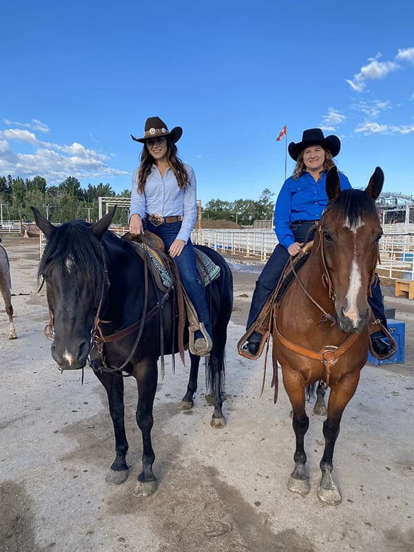  Jacquie and Kelcey taking part in the Stampede festivities.