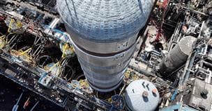 Aerial view of one of the new coke drums being installed at Base Plant.