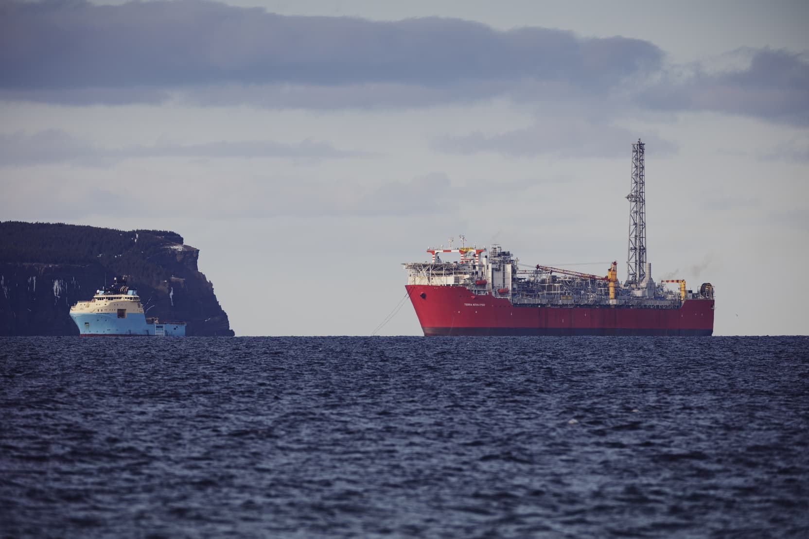 Side shot of the Terra Nova site with a smaller boat in front