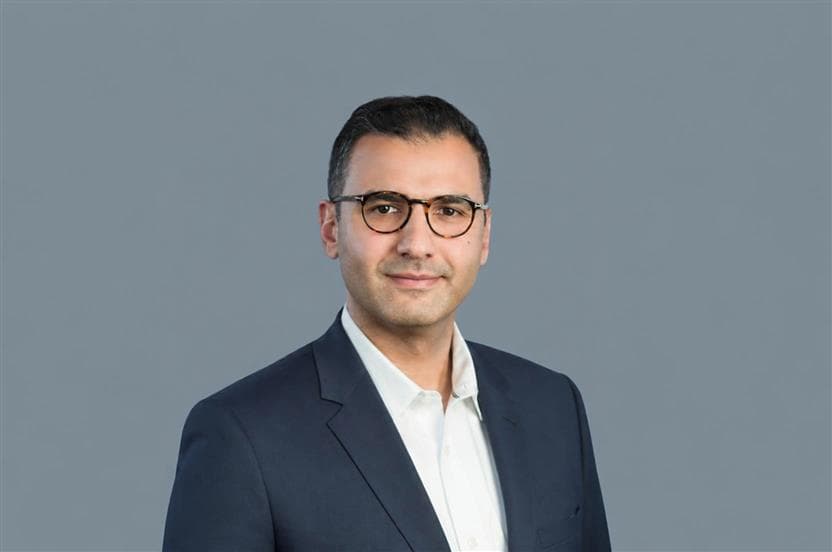 Professional headshot of Adam Albeldawi, Executive Vice President, Upstream, Suncor Energy