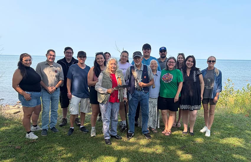 Members of Suncor’s Indigenous Youth Advisory Council gather for a group photo by the water in Sarnia, Ontario.